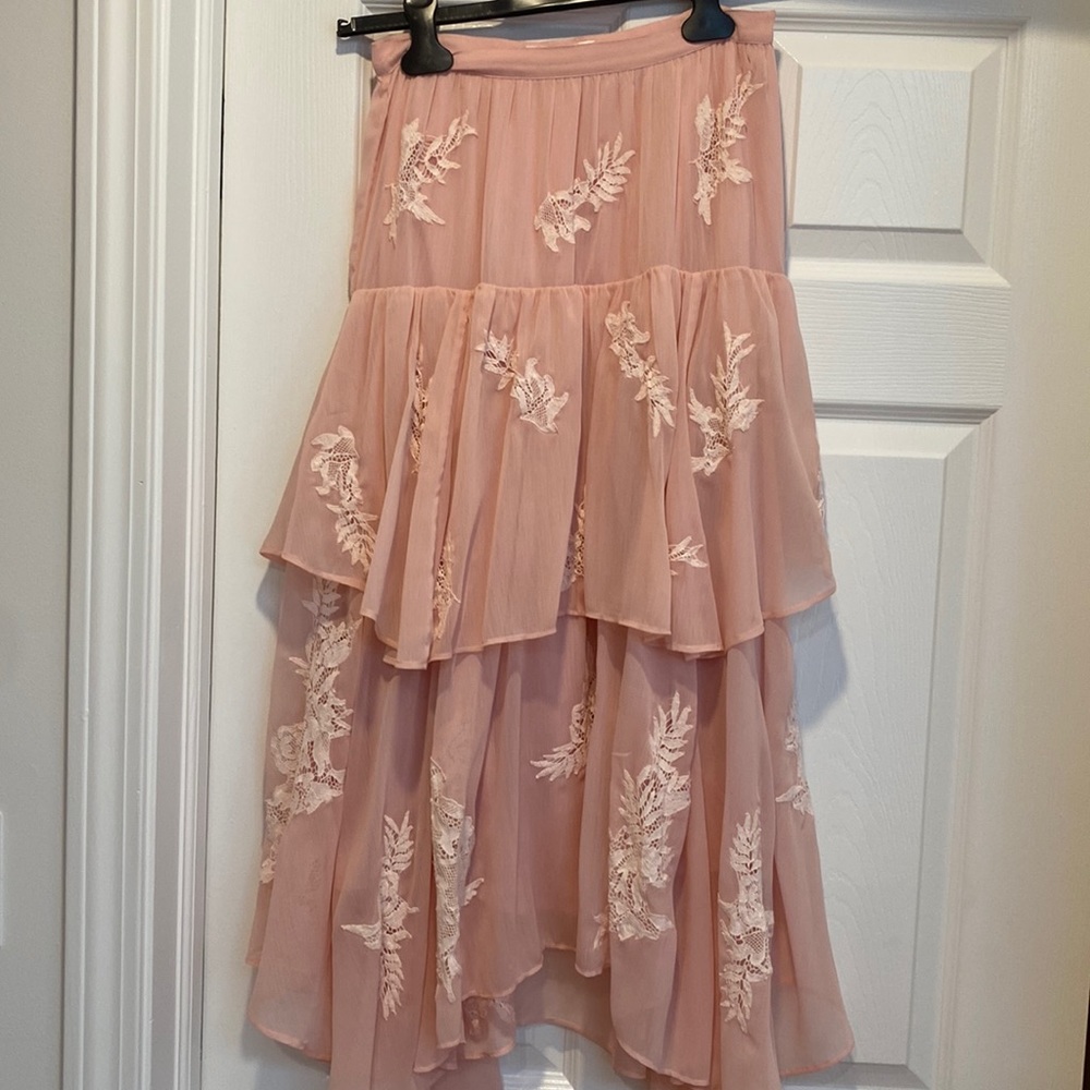 This skirt is in perfect condition only worn once.
